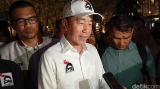 presiden ke 7 ri joko widodo jokowi saat mengenakan jaket psi usai menghadiri rakorda dpd psi kota bandar lampung 1782622822713 169